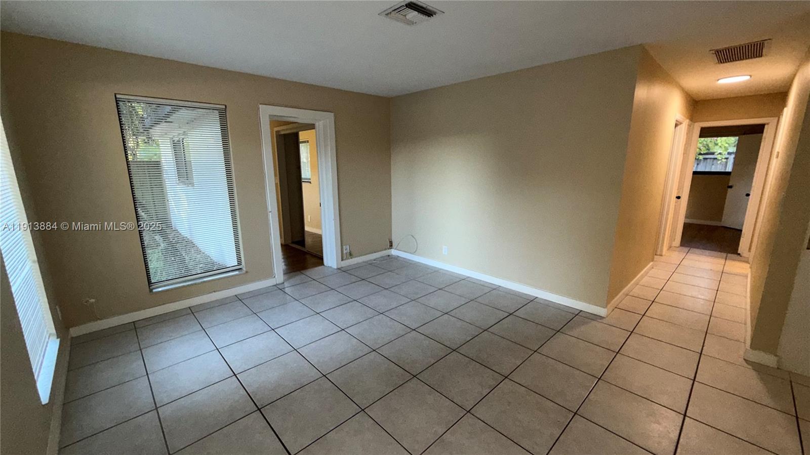 6625 Southwest 49th Street, Unit 2W Davie, FL 33314 - Photo 18 of 33 a view of an empty room and window