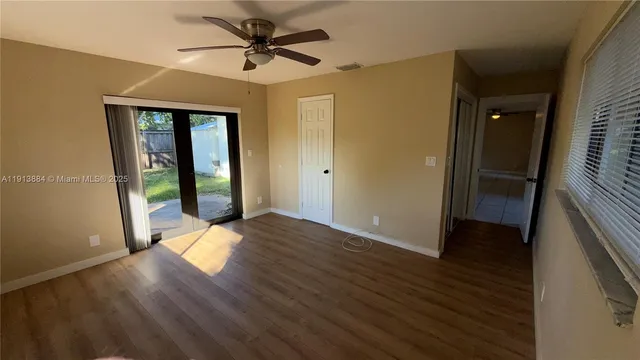 a bathroom with a shower and a sink