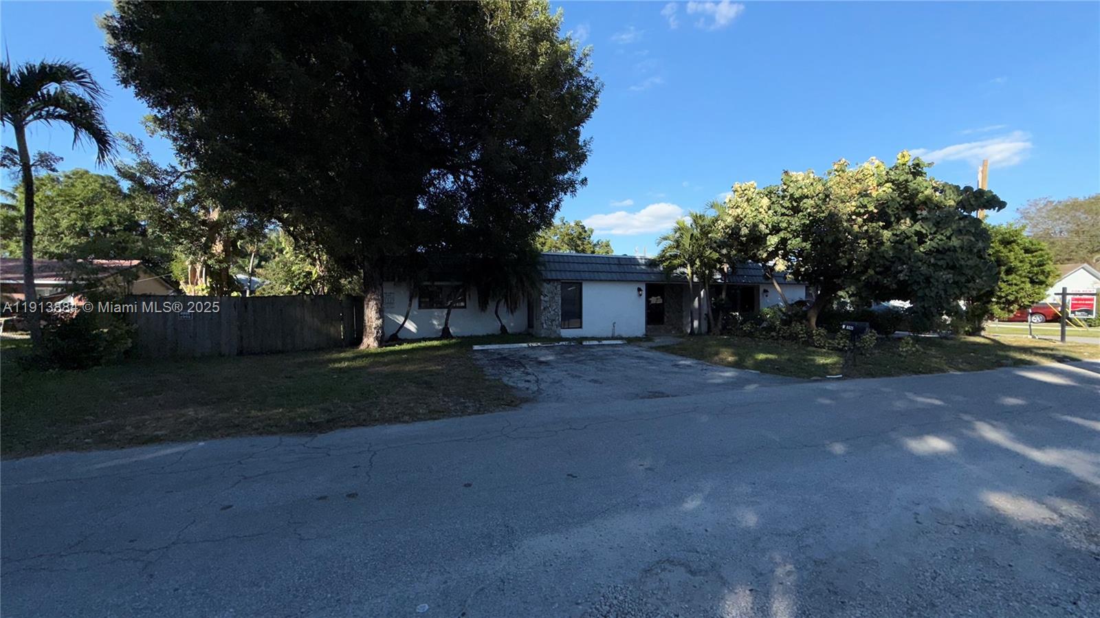 6625 Southwest 49th Street, Unit 2W Davie, FL 33314 - Photo 28 of 33 a view of a house with street