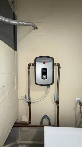 a bathroom with a bathtub and shower