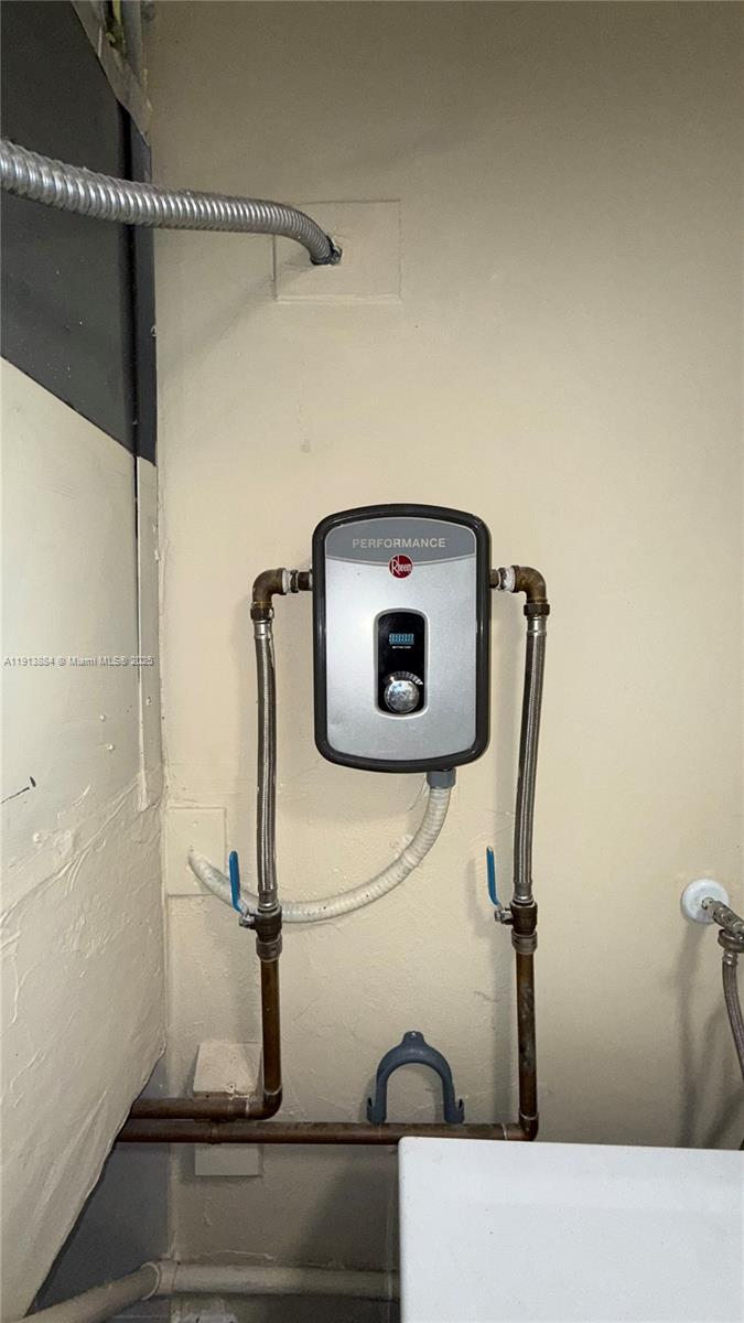 6625 Southwest 49th Street, Unit 2W Davie, FL 33314 - Photo 10 of 33 a bathroom with a bathtub and shower