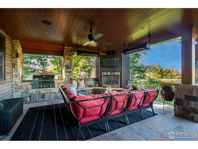 a outdoor dining space with furniture and garden view