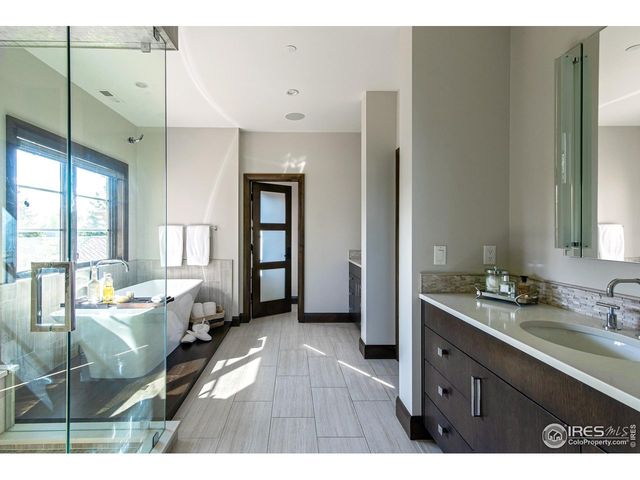 a open kitchen with sink and cabinets