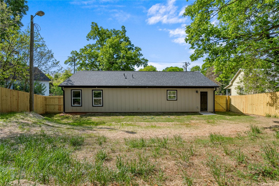 1215 East Whitner Street Anderson, SC 29624 - Photo 28 of 30 This charming home offers a private yard, perfect for outdoor enjoyment and serene living.
