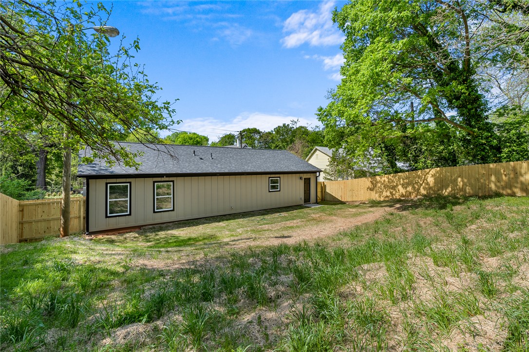 1215 East Whitner Street Anderson, SC 29624 - Photo 29 of 30 This charming home offers a private yard, perfect for outdoor living and entertaining.
