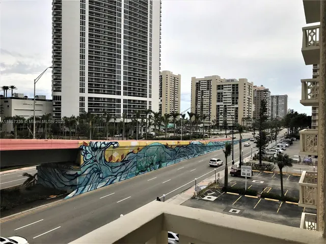 a view of balcony with two yard