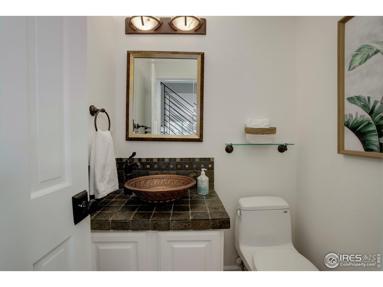 7240 Clubhouse Road Boulder, CO 80301 - Photo 16 of 34 a bathroom with a toilet and a sink