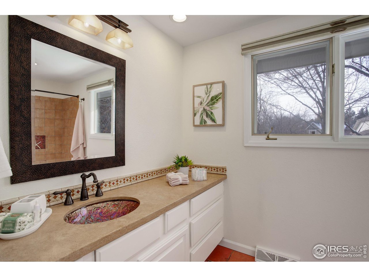7240 Clubhouse Road Boulder, CO 80301 - Photo 22 of 34 a bathroom with a sink and a mirror