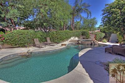 49145 Rio Arenoso La Quinta, CA 92253 - Photo 1 of 18 a view of a garden with patio