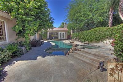 49145 Rio Arenoso La Quinta, CA 92253 - Photo 16 of 18 a view of a house with a patio