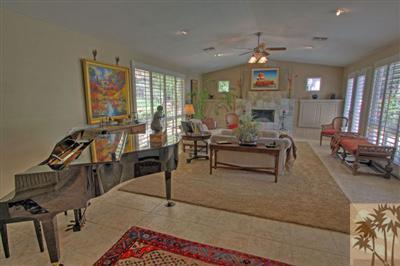 49145 Rio Arenoso La Quinta, CA 92253 - Photo 4 of 18 a living room with furniture and wooden floor