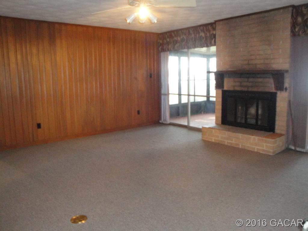 223 West River Road Palatka, FL 32177 - Photo 12 of 23 Living Area with Fireplace