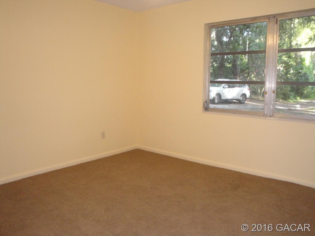223 West River Road Palatka, FL 32177 - Photo 15 of 23 One of three Bedrooms