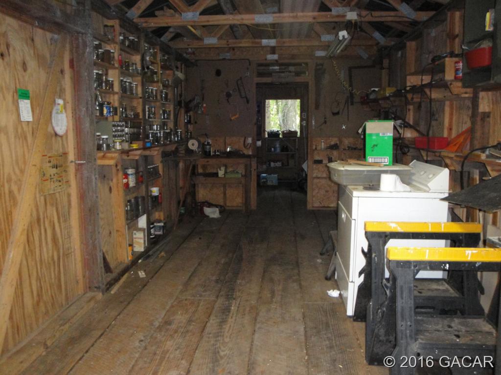 223 West River Road Palatka, FL 32177 - Photo 9 of 23 Interior of Workshop