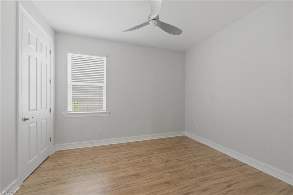 28310 Captiva Shell Loop Bonita Springs, FL 34135 - Photo 17 of 44 Unfurnished bedroom featuring light wood finished floors and a ceiling fan