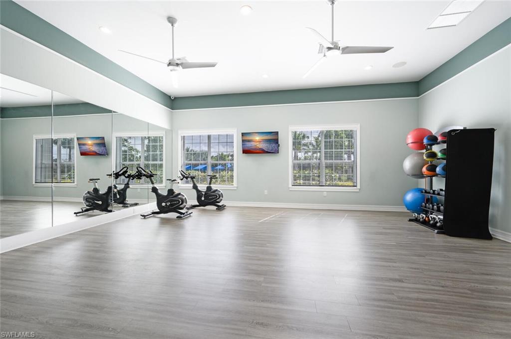28310 Captiva Shell Loop Bonita Springs, FL 34135 - Photo 43 of 44 Exercise room featuring ceiling fan and recessed lighting