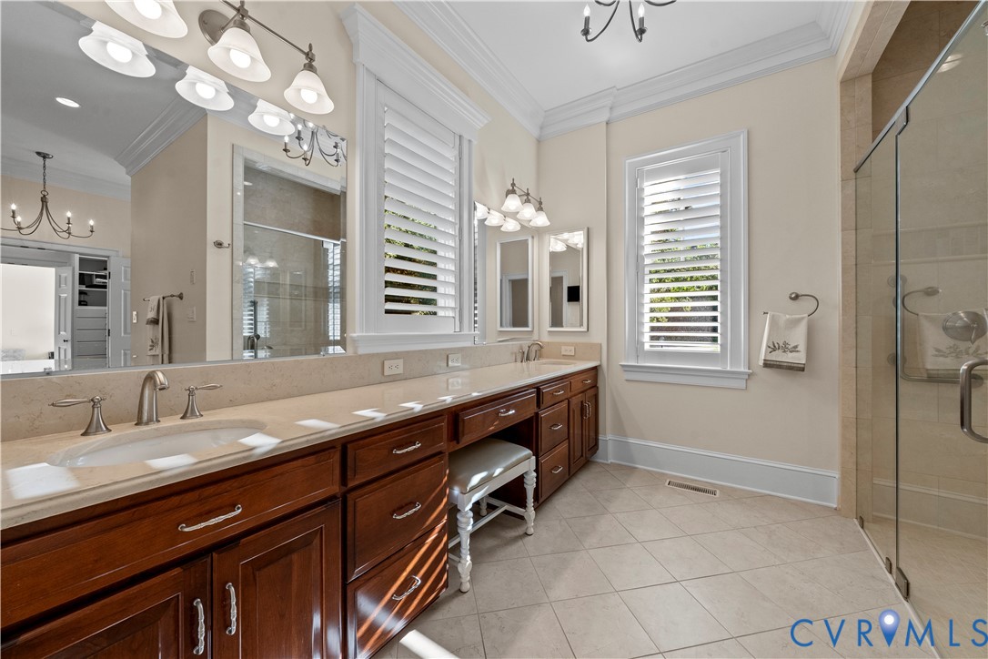 2515 Fleet's Bay Road White Stone, VA 22578 - Photo 27 of 74 a bathroom with a granite countertop sink a mirror and a shower