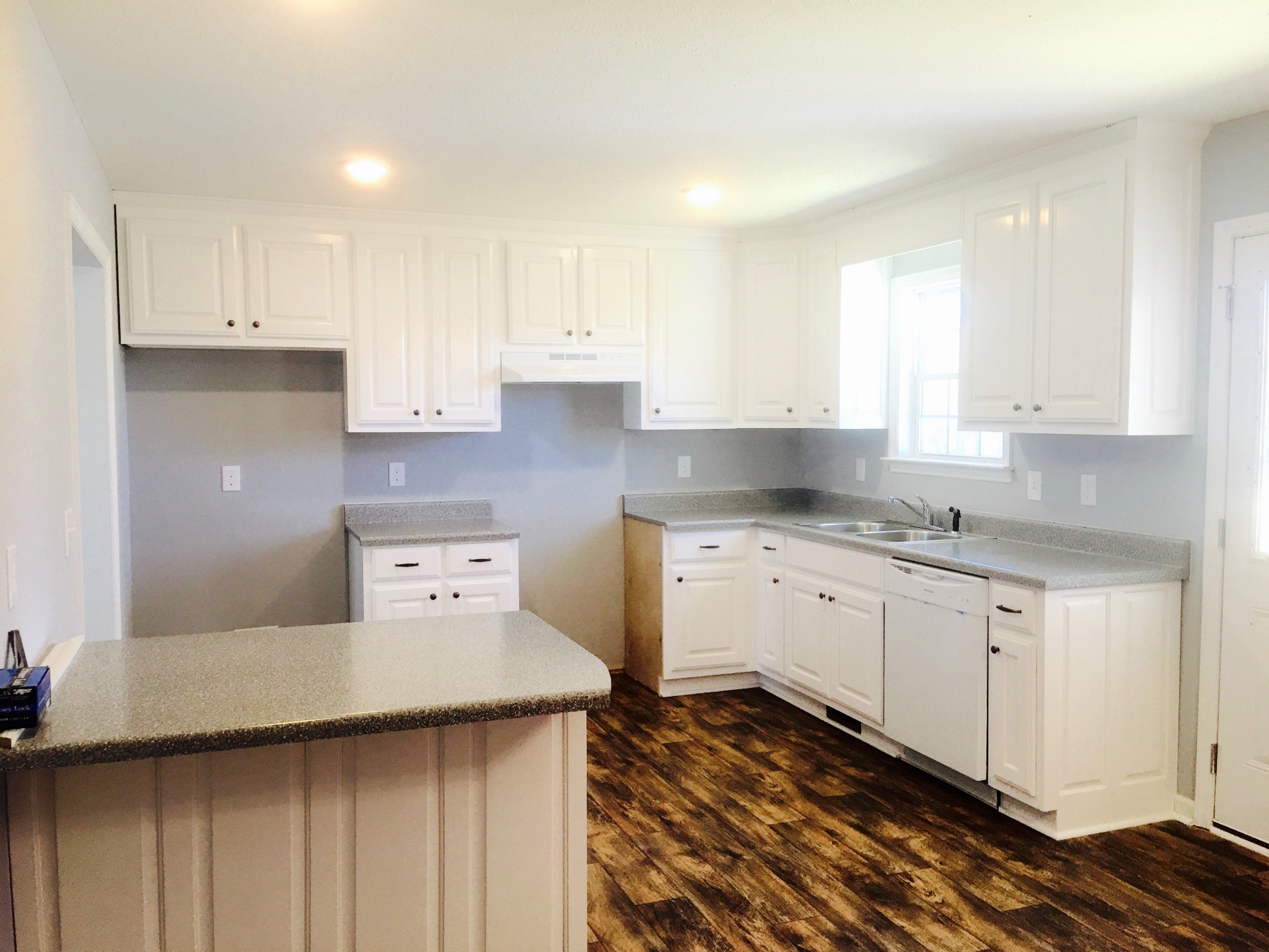160 Limestone Road Elora, TN 37328 - Photo 4 of 18 a kitchen with granite countertop a sink a stove and cabinets