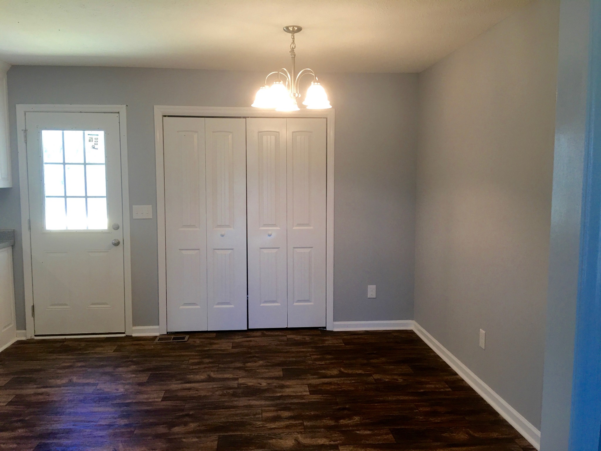 160 Limestone Road Elora, TN 37328 - Photo 6 of 18 a view of an empty room with wooden floor and a window