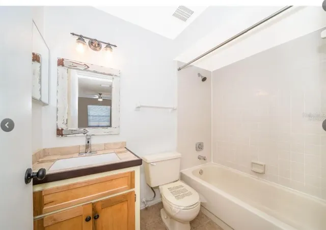 a view of a room with a walk in closet