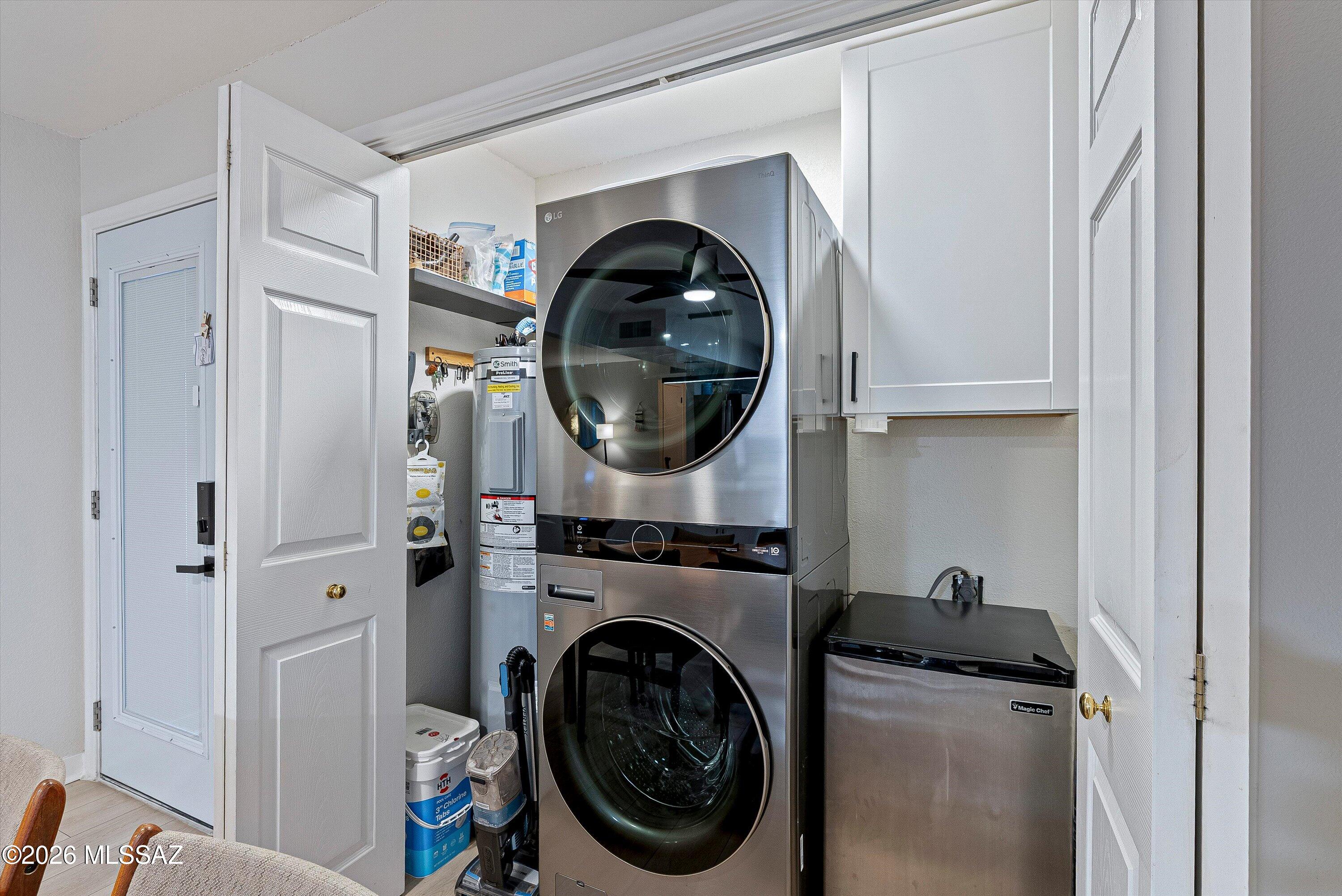 3949 West Mars Street Tucson, AZ 85741 - Photo 20 of 27 a utility room with dryer and washer