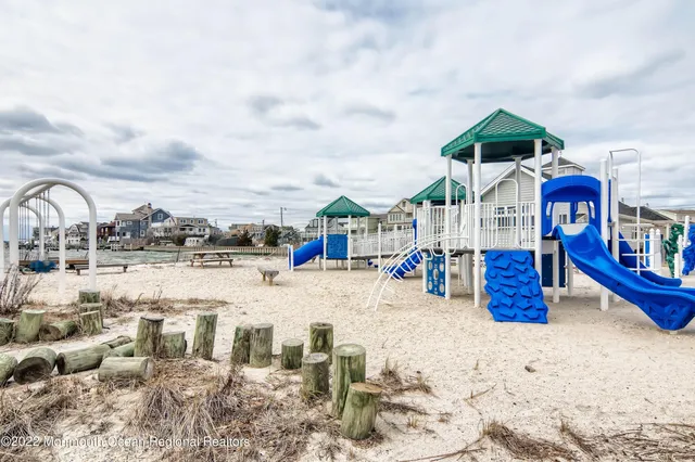 a view of a swimming pool with lounge chair