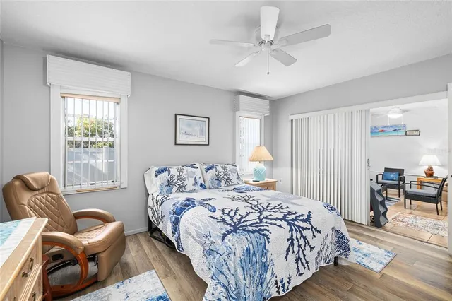 a bedroom with a bed and a couch