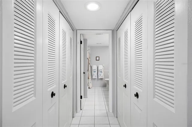 a view of a bathroom with a shower curtain