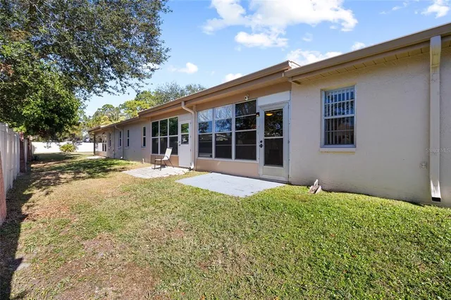 a house view with swimming pool and porch with furniture