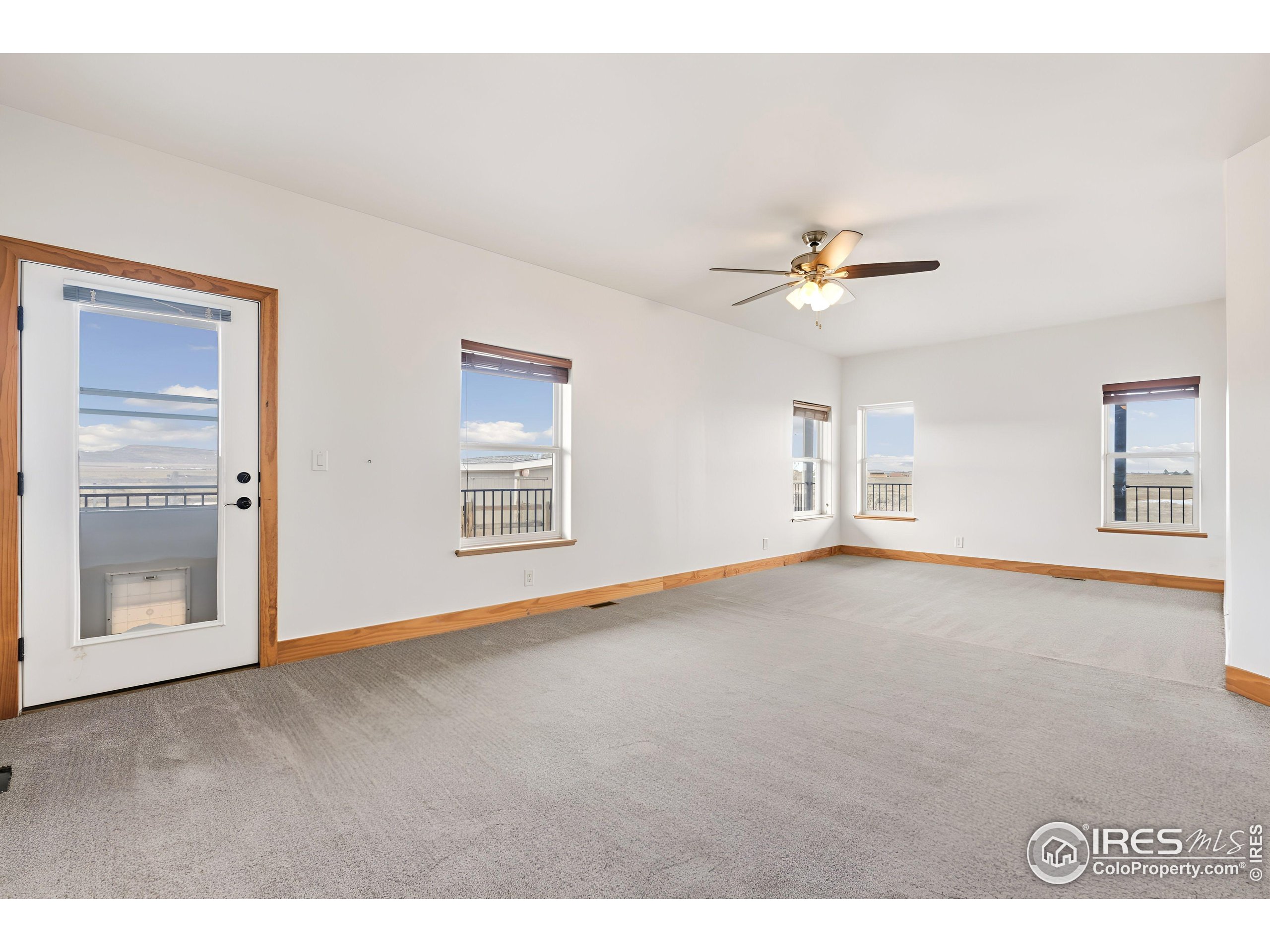 7321 Gilmore Avenue Fort Collins, CO 80524 - Photo 17 of 37 a view of an empty room with a window