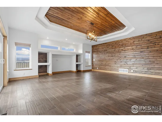 a view of a livingroom with wooden floor