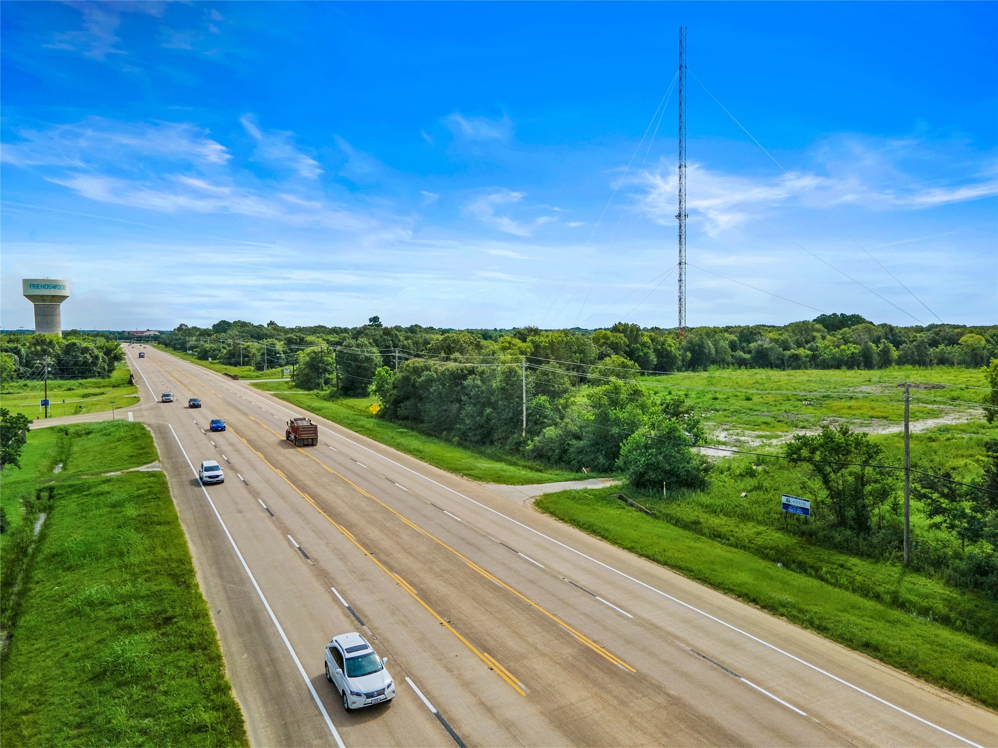 0 Fm-528 Friendswood, TX 77546 - Photo 1 of 11 a view of a garden with an buildings