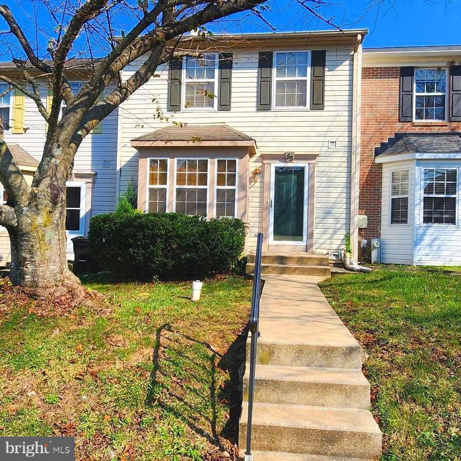 55 Powder View Court Nottingham, MD 21236 - Photo 1 of 20 a front view of a house with a yard