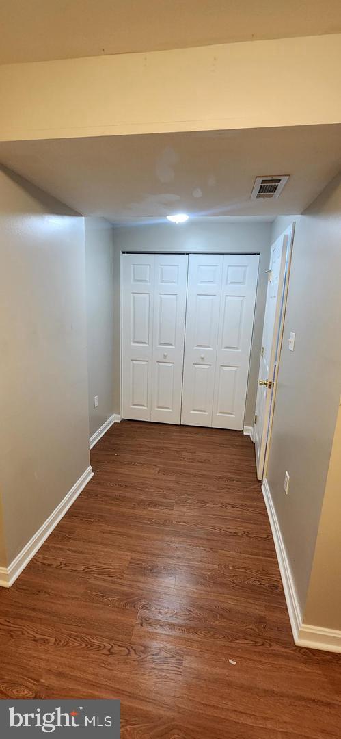 55 Powder View Court Nottingham, MD 21236 - Photo 20 of 20 a view of an empty room with wooden floor