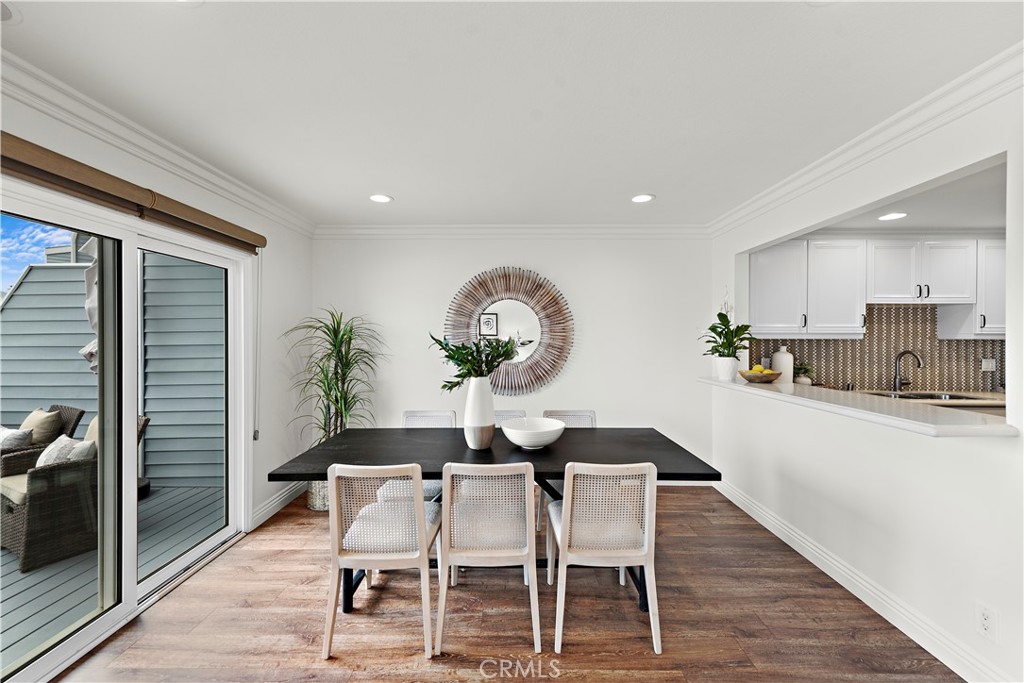 24592 Harbor View Drive, Unit B Dana Point, CA 92629 - Photo 11 of 33 a view of a dining room with furniture and wooden floor