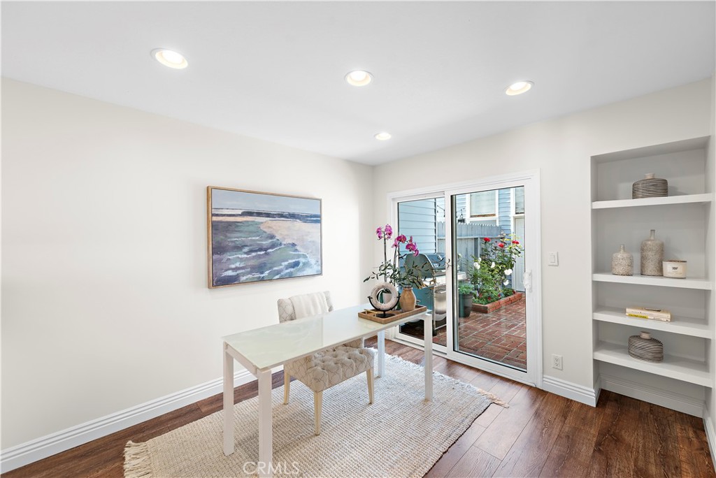 24592 Harbor View Drive, Unit B Dana Point, CA 92629 - Photo 15 of 33 a view of a workspace with furniture and wooden floor