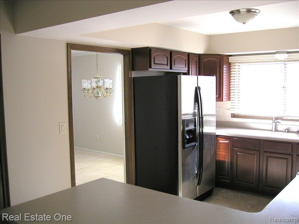 12001 North Canton Center Road Plymouth, MI 48170 - Photo 4 of 19 Gorgeous Kitchen w/SS appliances
