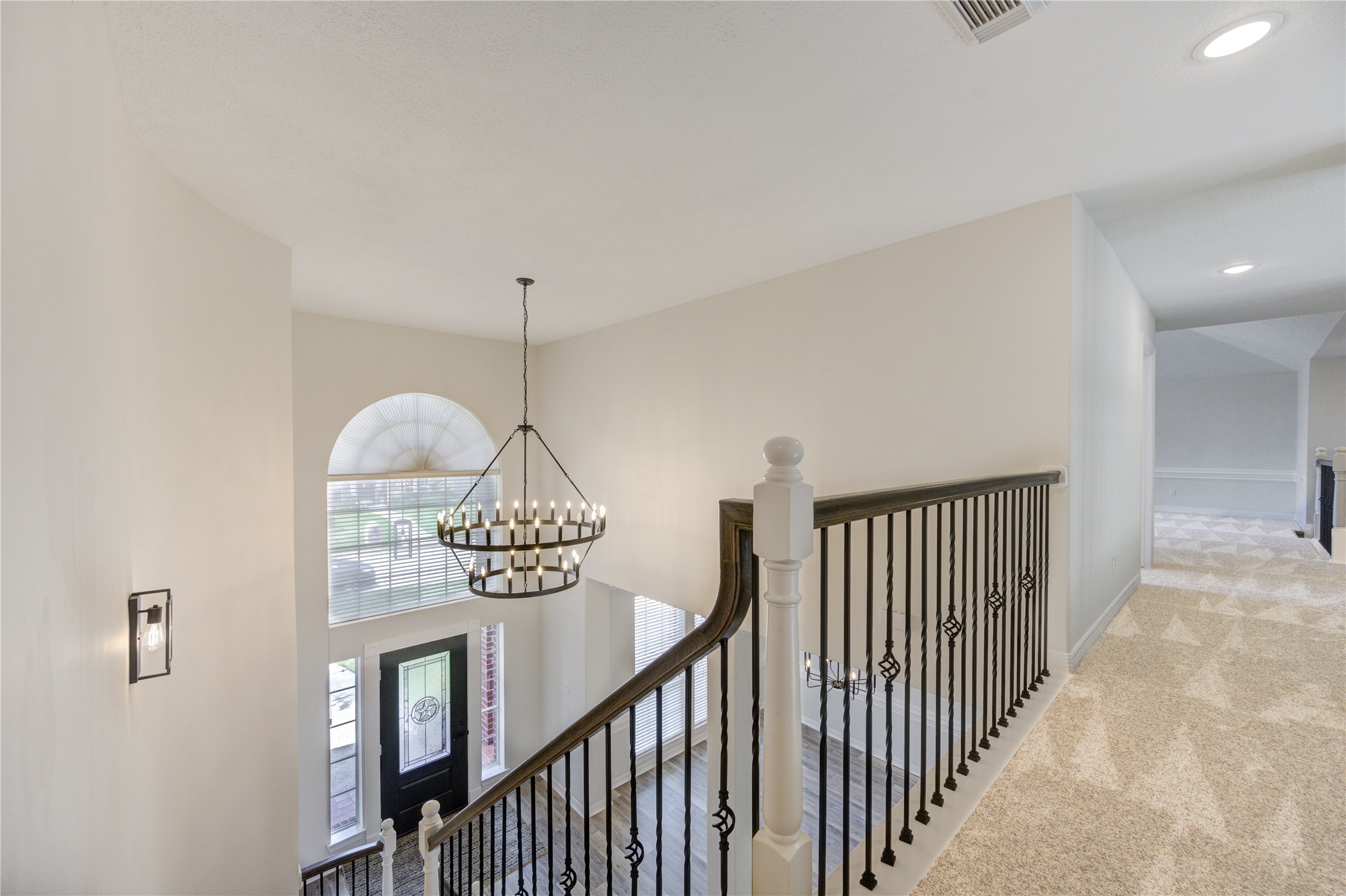 17318 Bonnard Circle Spring, TX 77379 - Photo 30 of 45 Look at the beautiful chandelier over the foyer.