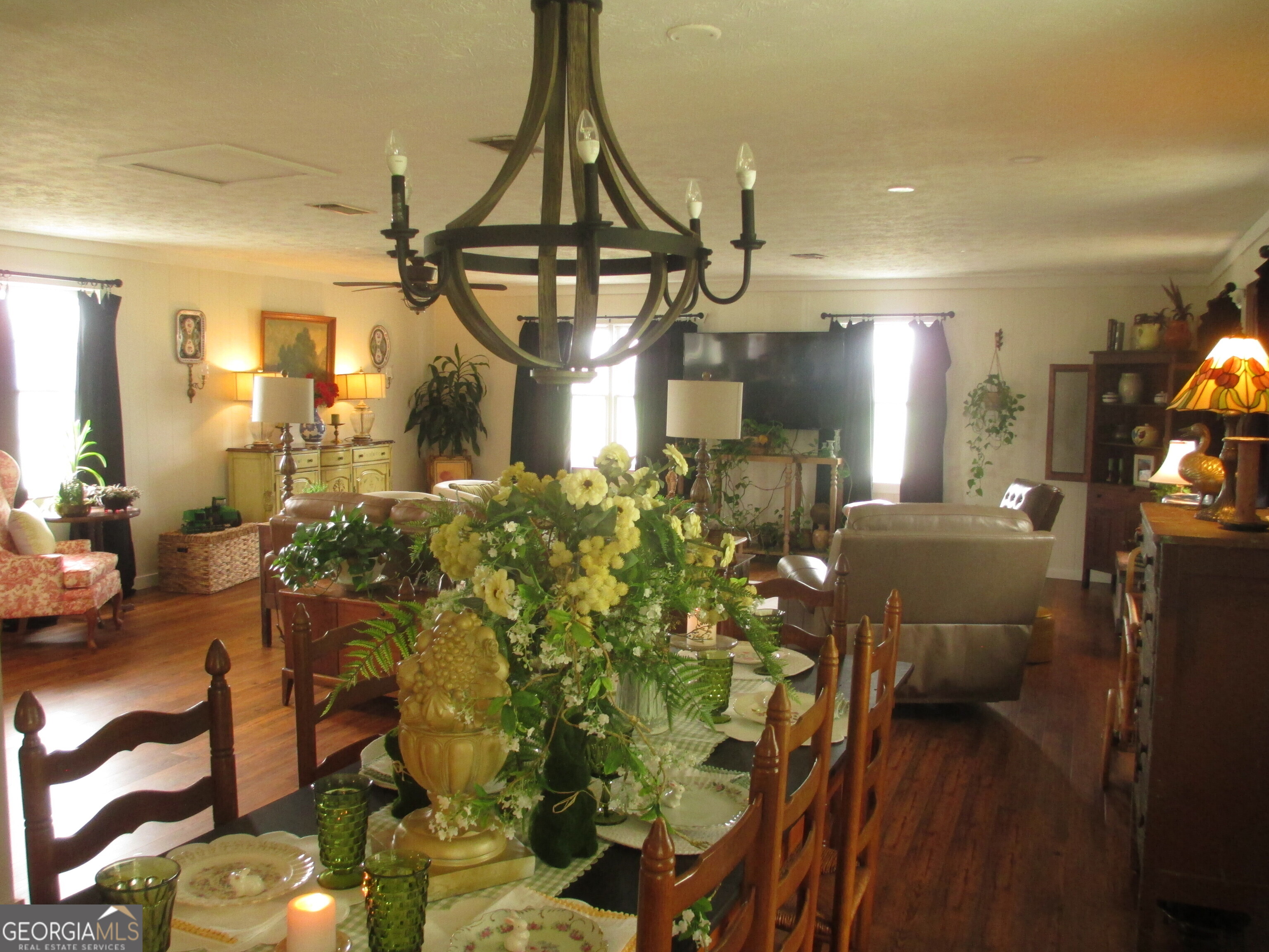 84 Comer Yawn Road Hazlehurst, GA 31539 - Photo 14 of 24 a view of a living room and a chandelier