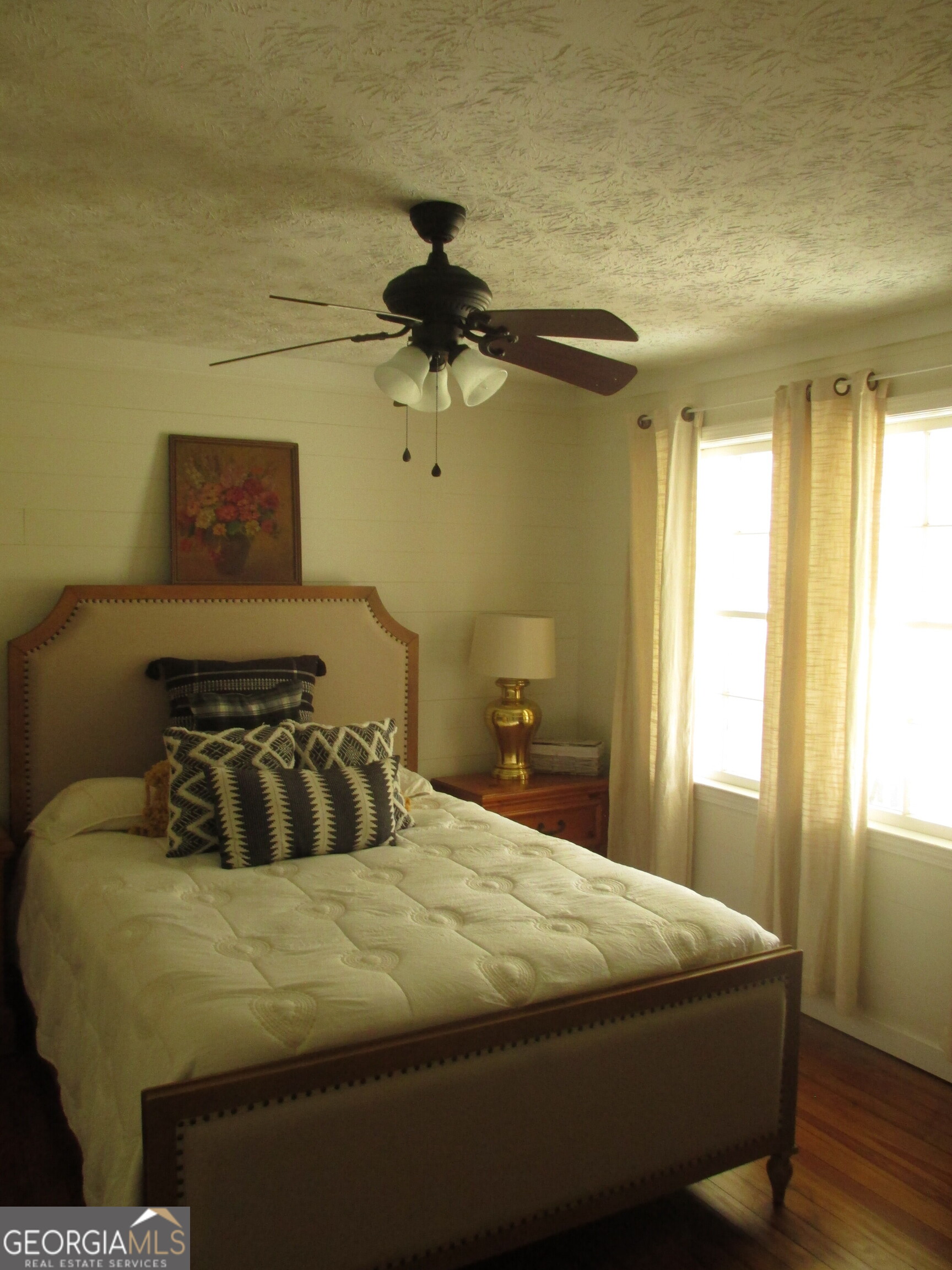 84 Comer Yawn Road Hazlehurst, GA 31539 - Photo 18 of 24 a bedroom with a bed and a window