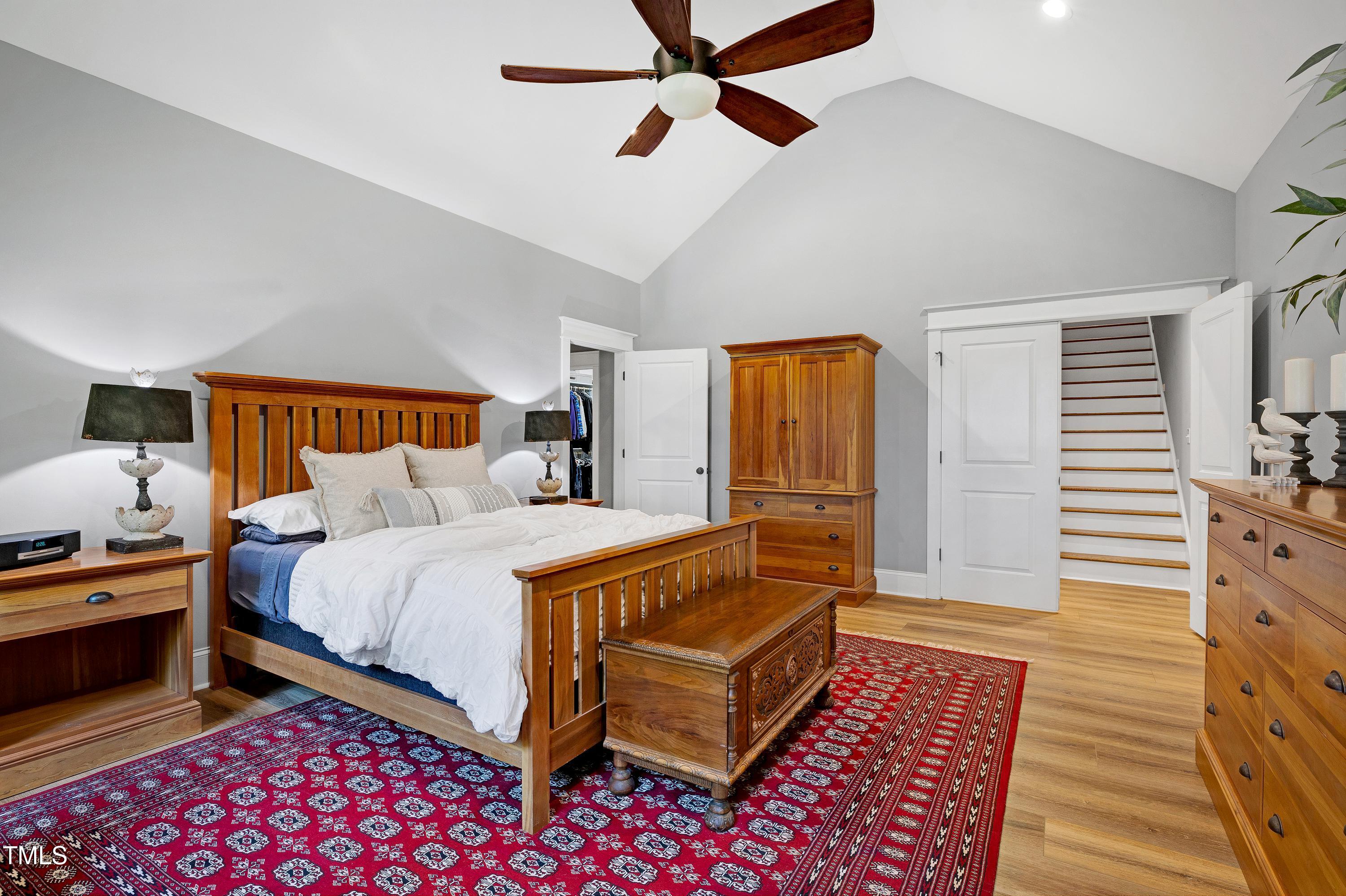 5859 Vicksboro Road Henderson, NC 27537 - Photo 31 of 65 a bedroom with a bed and wooden floor