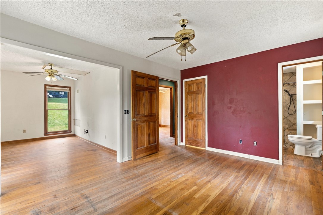 133 Pinetree Lane Easley, SC 29640 - Photo 25 of 28 Rich hardwood flooring flows seamlessly throughout this versatile and open living space.