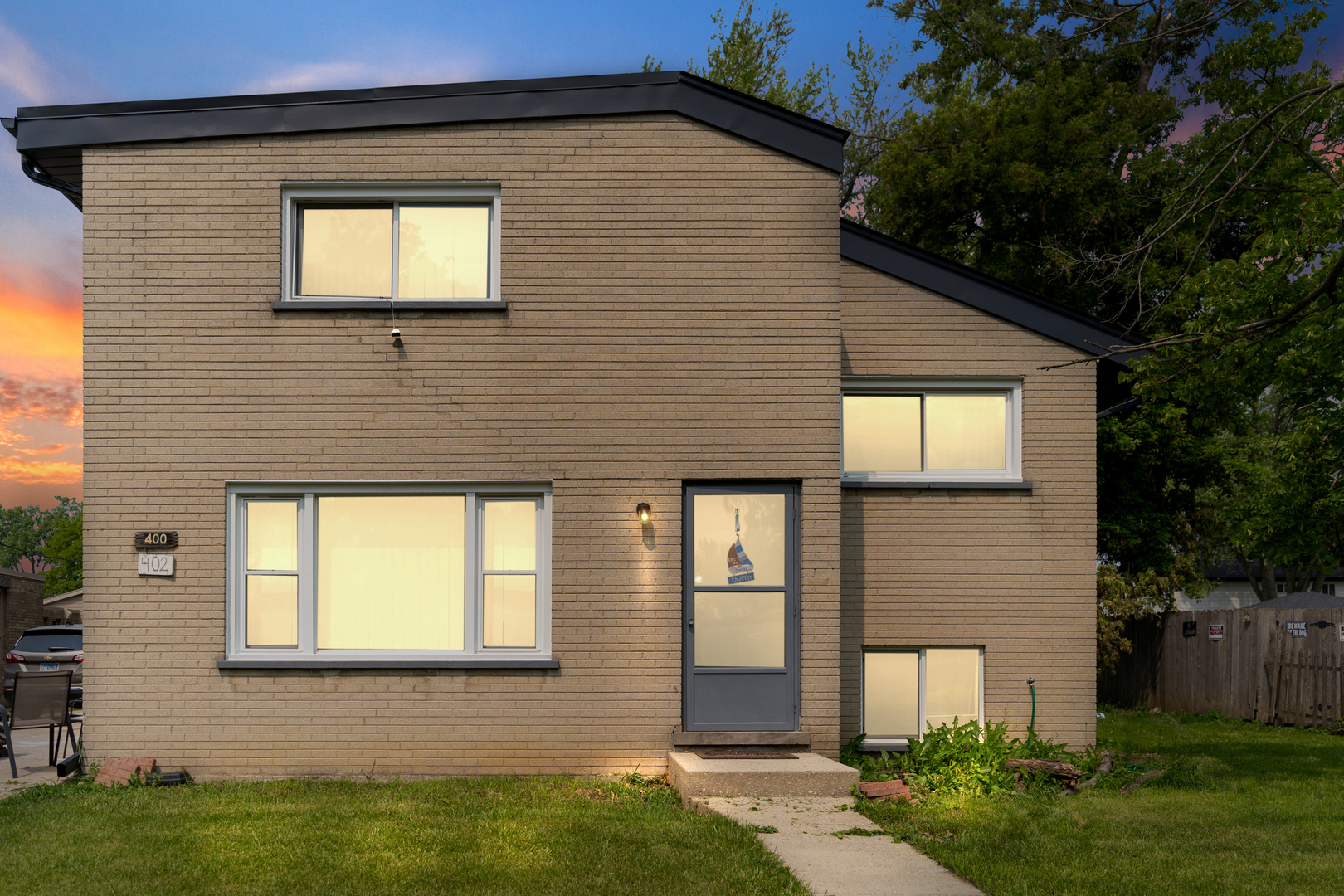 400 North Addison Road Villa Park, IL 60181 - Photo 1 of 21 a front view of a house with garden