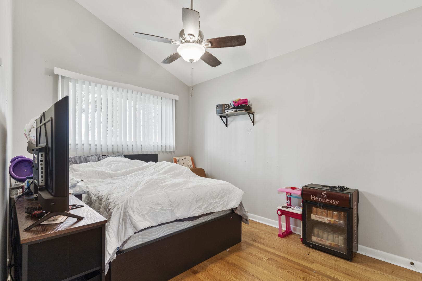 400 North Addison Road Villa Park, IL 60181 - Photo 13 of 21 a bedroom with bed and a chandelier