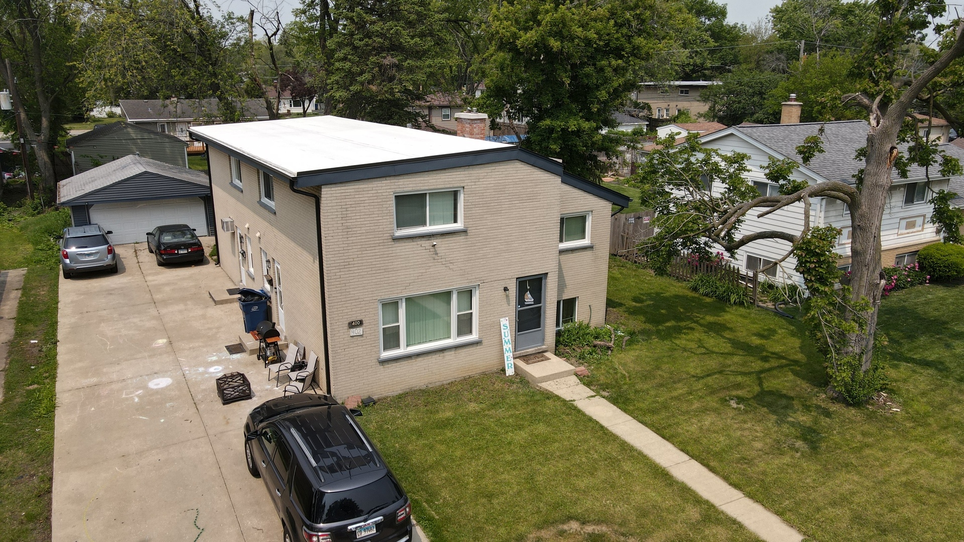 400 North Addison Road Villa Park, IL 60181 - Photo 20 of 21 a aerial view of a house with swimming pool and patio