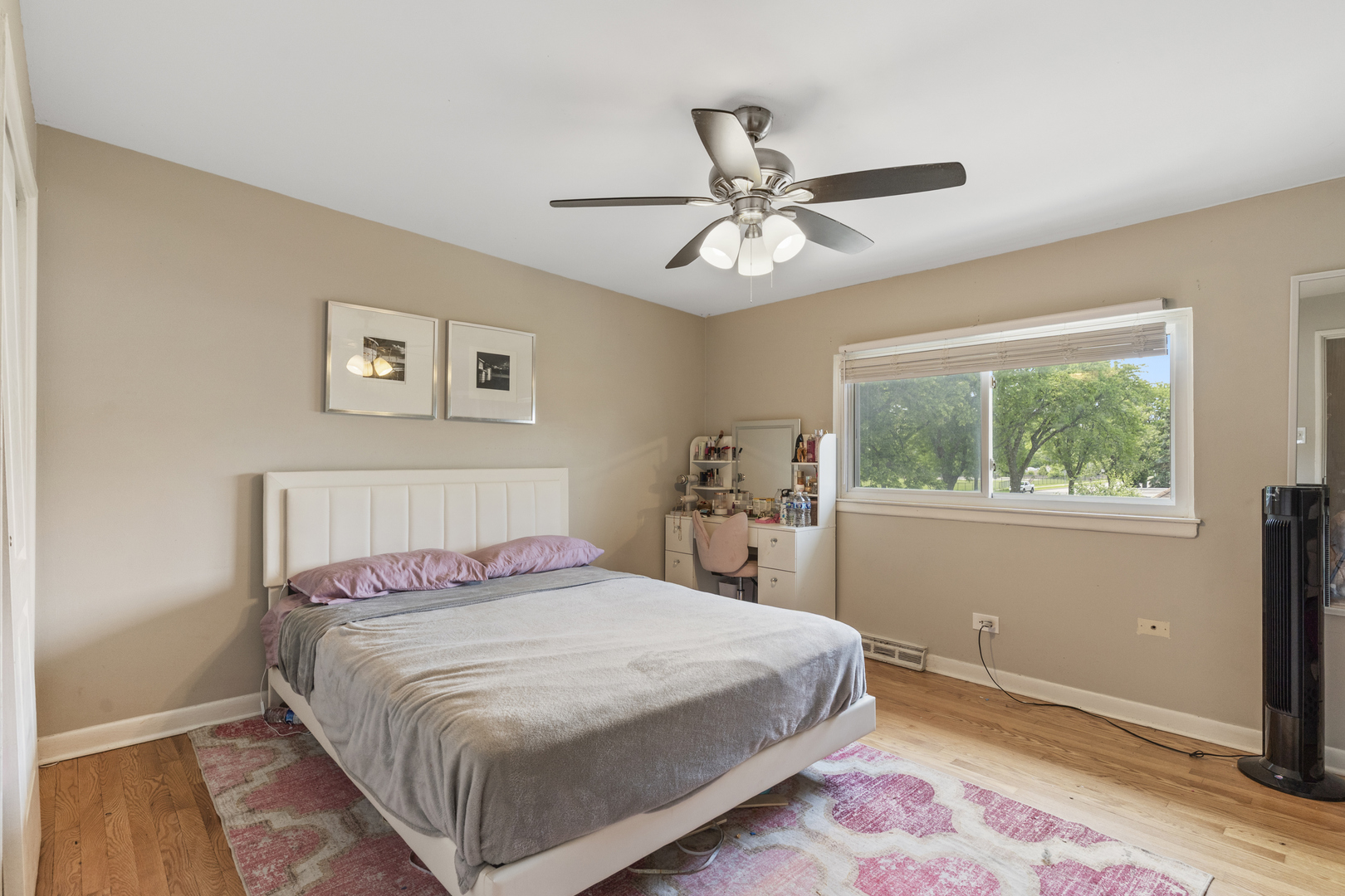 400 North Addison Road Villa Park, IL 60181 - Photo 9 of 21 a bedroom with a large bed and a window