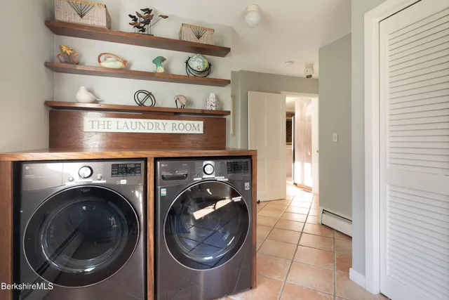 a view of washer and dryer in a utility room