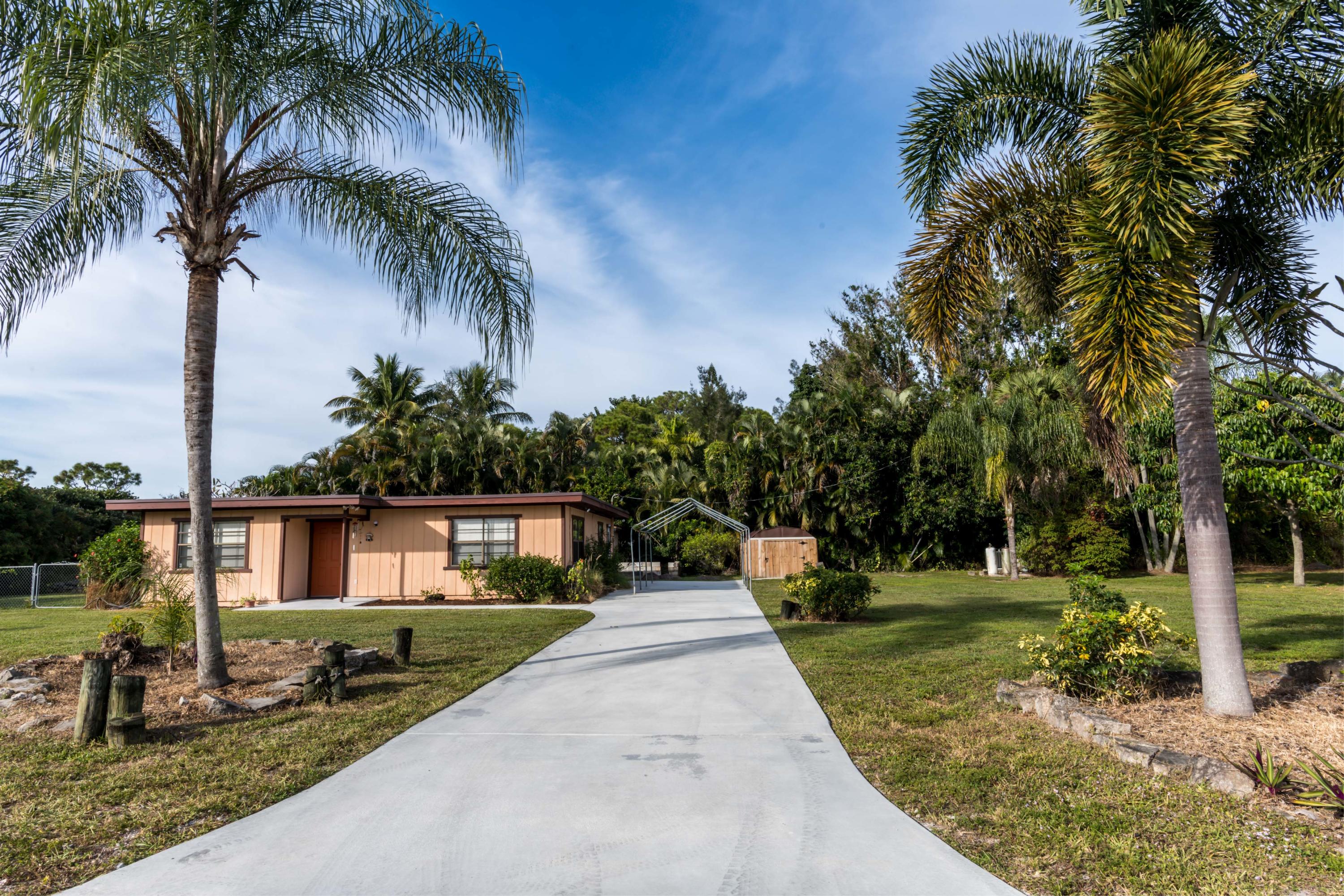 156 Akron Road Lake Worth, FL 33467 - Photo 1 of 22 Front