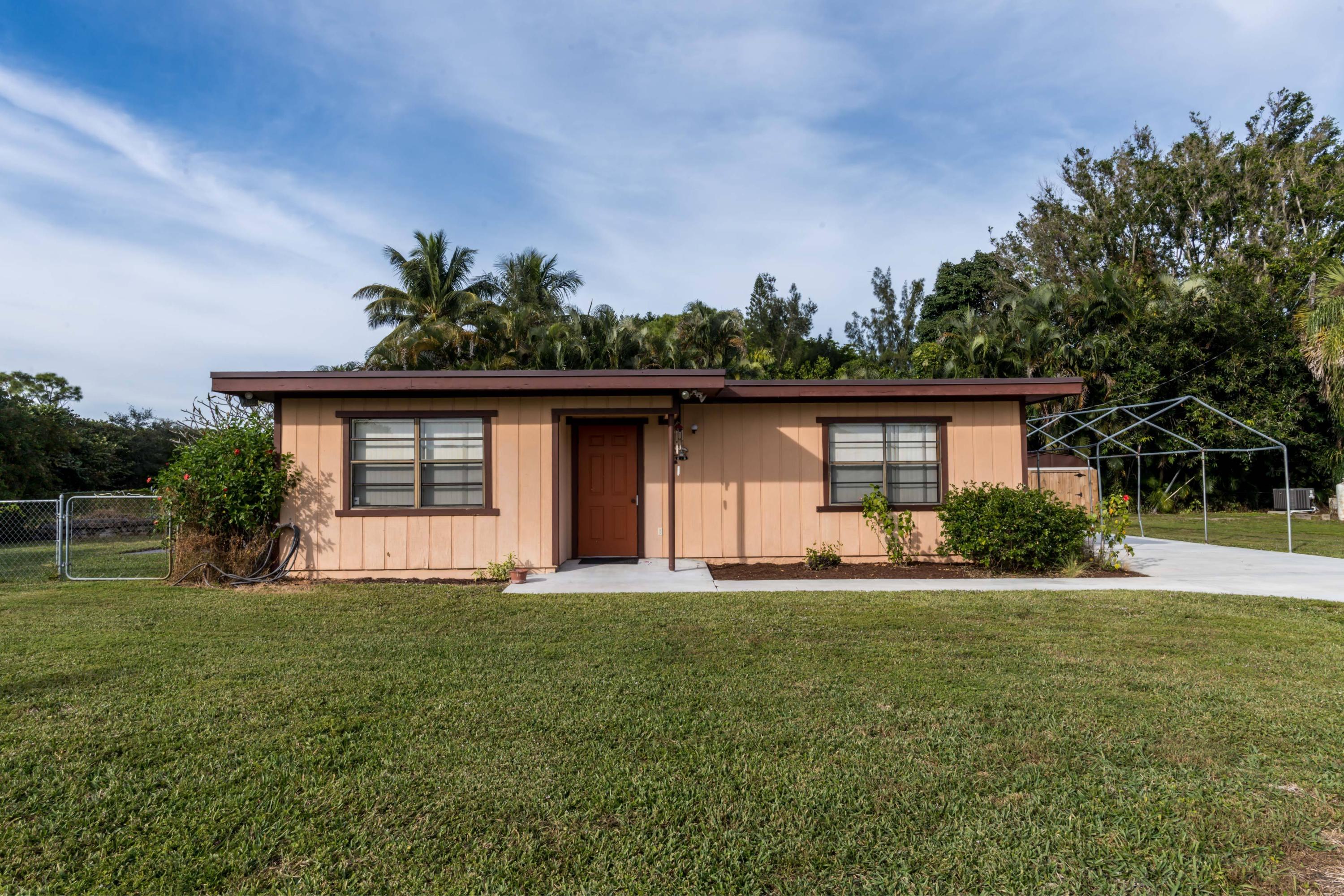 156 Akron Road Lake Worth, FL 33467 - Photo 16 of 22 1 Front Close UP