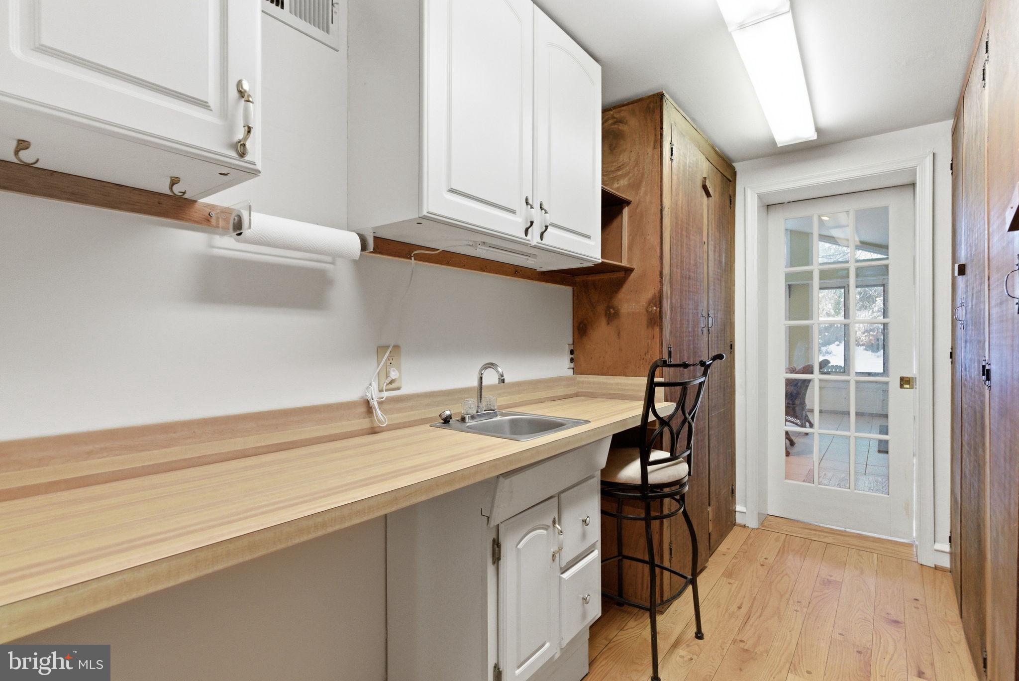 416 Rices Mill Road Wyncote, PA 19095 - Photo 13 of 60 a kitchen with a sink cabinets and appliances